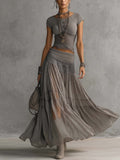 Top Grigio Trasparente con Pannelli in Pizzo e Set di Gonna Maxy Plissettata