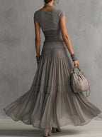 Top Grigio Trasparente con Pannelli in Pizzo e Set di Gonna Maxy Plissettata