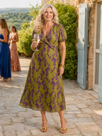 Abito elegante verde con stampa di fiori viola