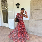 Elegante vestido largo con hombro descubierto