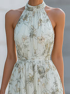 Abito lungo in Chiffon con Stampa Floreale e Collo Halter