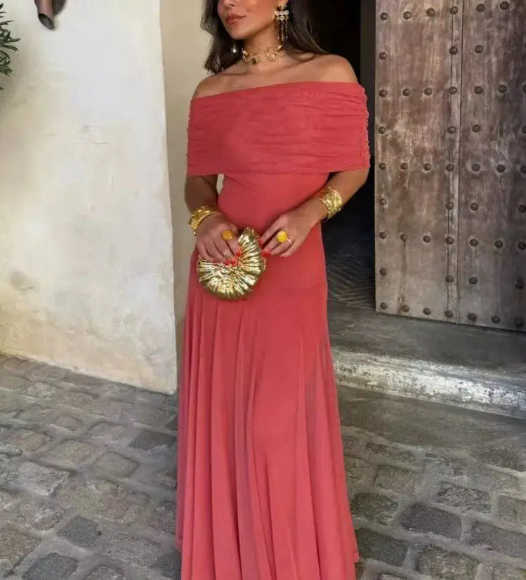 Elegante vestido largo con hombro descubierto