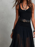 Top senza maniche nero con gonna in tulle maxi