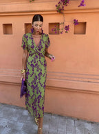 Abito elegante verde con stampa di fiori viola