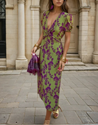 Abito elegante verde con stampa di fiori viola